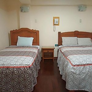 Habitación con 2 Camas Individuales